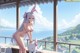 A naked anime girl with long white hair and bunny ears standing on a balcony.